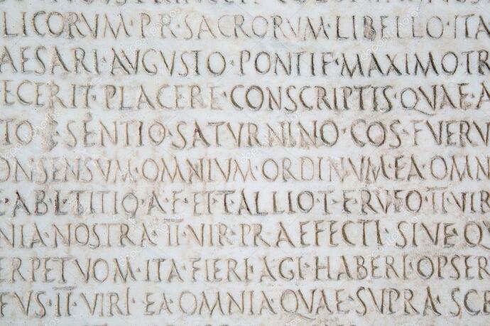 depositphotos_75743813-stock-photo-latin-words-carved-on-ancient